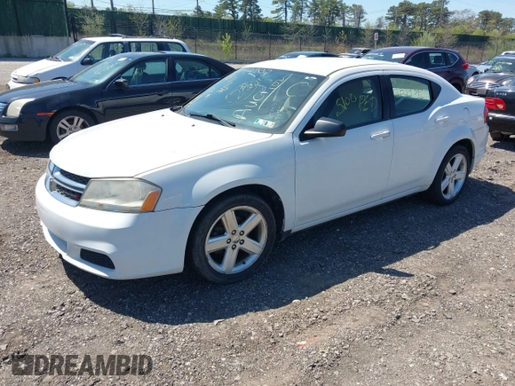 2013 Dodge Avenger SE with VIN 1C3CDZABXDN551796, listed as a IAAI auction lot 42142302 with 999,999 mi miles. Bid and sale history available at carsss.com. Image 2.