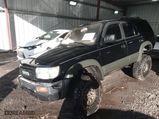 1997 Toyota 4Runner Limited with VIN JT3HN87R9V0073242, listed as a IAAI auction lot 41664630 with 189,225 mi miles. Bid and sale history available at carsss.com. Image 2.