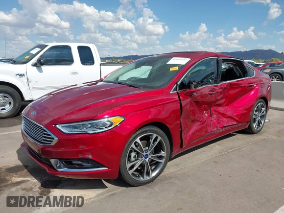 2017 Ford Fusion Titanium with VIN 3FA6P0K98HR207447, listed as a IAAI auction lot 42422213 with 59,549 mi miles and . Bid and sale history available at DreamBid. Image 6.