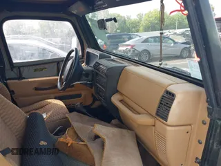 1998 Jeep Wrangler SE with VIN 1J4FY29P8WP793427, listed as a IAAI auction lot 42546515 with 145,388 mi miles and . Bid and sale history available at DreamBid. Image 5.