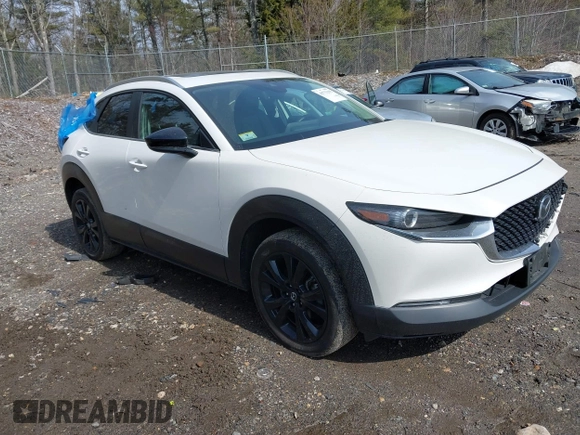 2022 Mazda CX-30 2.5 Turbo with VIN 3MVDMBAY7NM443187, listed as a IAAI auction lot 41771395 with 39,475 mi miles and . Bid and sale history available at DreamBid. Image 1.
