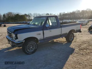 1990 Ford F-150 with VIN 1FTEF14N1LNA30373, listed as a Copart auction lot 85961874 with 27,509 mi miles and Salvage Title. Bid and sale history available at carsss.com. Image 1.