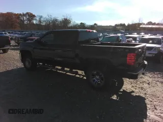 2017 Chevrolet Silverado 1500 LT with VIN 3GCUKREC0HG493446, listed as a Copart auction lot 79068394 with 99,753 mi miles and Salvage Title. Bid and sale history available at DreamBid. Image 2.