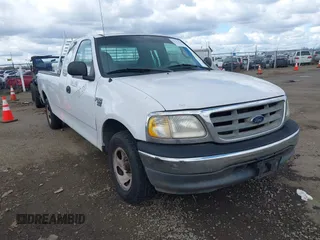 2000 Ford F-150 XL with VIN 1FTRX17W5YKB03384, listed as a IAAI auction lot 41723526 with 281,658 mi miles. Bid and sale history available at carsss.com. Image 1.