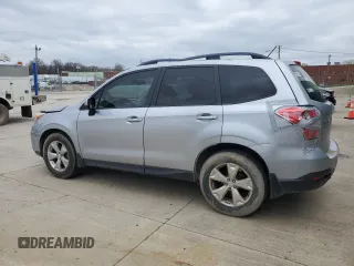2014 Subaru Forester 2.5i Premium with VIN JF2SJAEC4EH450128, listed as a Copart auction lot 52442065 with 221,511 mi miles and Salvage Title. Bid and sale history available at carsss.com. Image 2.