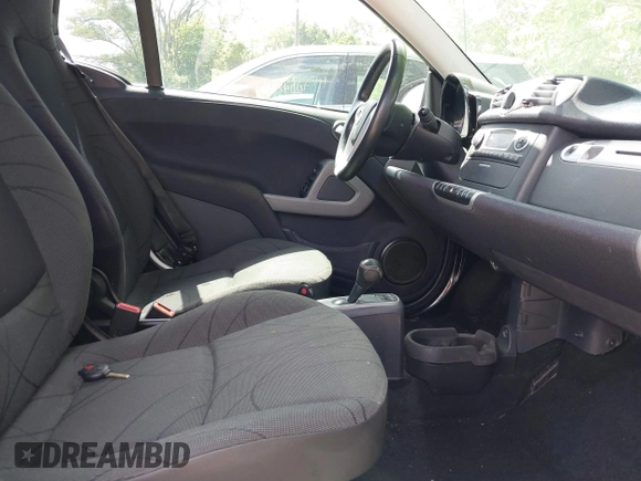 2013 Smart fortwo Pure with VIN WMEEJ3BA9DK585327, listed as a IAAI auction lot 42343616 with 101,194 mi miles and . Bid and sale history available at DreamBid. Image 5.