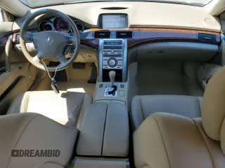 2006 Acura RL z VIN JH4KB16576C012132, wystawiony jako Copart lot #61897805 z przebiegiem 143 101 mil mil oraz Szkoda całkowita • Salvage title. Historia ofert i sprzedaży dostępna na DreamBid. Obrazek 8.