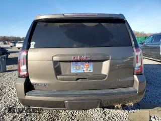 2015 GMC Yukon SLT with VIN 1GKS1BKC8FR664001, listed as a Copart auction lot 84391784 with 0 mi miles and Salvage Title. Bid and sale history available at carsss.com. Image 6.