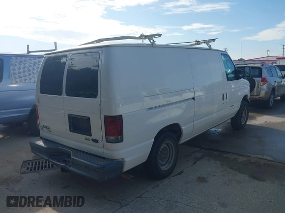 2011 Ford Econoline Cargo Commercial with VIN 1FTNE1EW1BDA52968, listed as a IAAI auction lot 42591275 with 359,304 mi miles and . Bid and sale history available at DreamBid. Image 4.