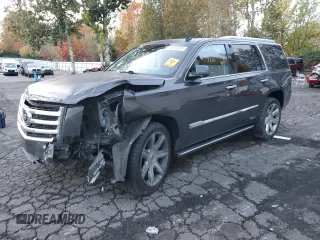 2015 Cadillac Escalade Premium z VIN 1GYS4CKJ5FR261529, wystawiony jako Copart lot #79219374 z przebiegiem 140 404 mil mil oraz Szkody całkowita. Historia ofert i sprzedaży dostępna na DreamBid. Obrazek 1.