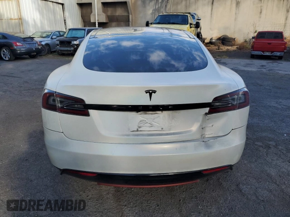 2013 Tesla Model S with VIN 5YJSA1AC8DFP10890, listed as a Copart auction lot 60735174 with 51,847 mi miles and Clean Title. Bid and sale history available at DreamBid. Image 6.