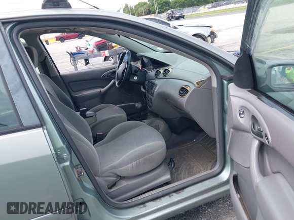 2004 Ford Focus with VIN 3FAFP37Z74R103228, listed as a IAAI auction lot 42658143 with 90,519 mi miles and . Bid and sale history available at DreamBid. Image 5.