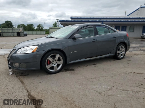 2009 Pontiac G6 GXP 1SA with VIN 1G2ZM577294217264, listed as a Copart auction lot 63824735 with 165,948 mi miles and Salvage title. Bid and sale history available at DreamBid. Image 1.