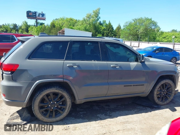 2019 Jeep Grand Cherokee Laredo E with VIN 1C4RJFAG8KC849782, listed as a IAAI auction lot 42151331 with 141,099 mi miles and . Bid and sale history available at DreamBid. Image 13.