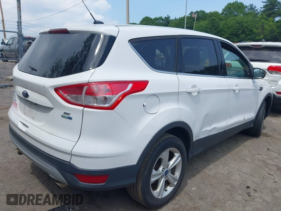 2014 Ford Escape SE z VIN 1FMCU9GX1EUD66666, wystawiony jako IAAI lot #42571222 z przebiegiem Nie podano mil oraz . Historia ofert i sprzedaży dostępna na DreamBid. Obrazek 4.