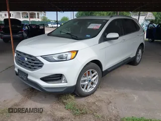 2021 Ford Edge SEL z VIN 2FMPK3J98MBA32220, wystawiony jako IAAI lot #41945825 z przebiegiem Nie podano mil oraz . Historia ofert i sprzedaży dostępna na DreamBid. Obrazek 17.