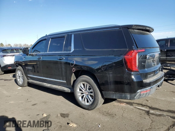 2021 GMC Yukon XL SLT with VIN 1GKS1GKD2MR243619, listed as a Copart auction lot 84262484 with 125,419 mi miles and Salvage Title. Bid and sale history available at carsss.com. Image 2.