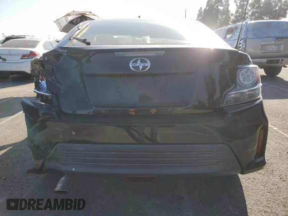 2016 Scion tC z VIN JTKJF5C79GJ020110, wystawiony jako Copart lot #86995214 z przebiegiem 79 165 mil mil oraz Szkody całkowita. Historia ofert i sprzedaży dostępna na DreamBid. Obrazek 6.