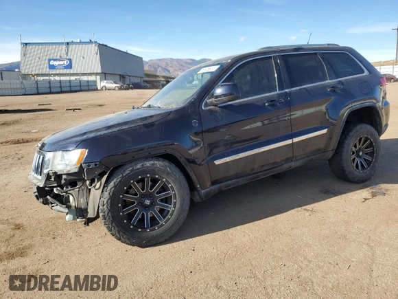 2011 Jeep Grand Cherokee 70th Anniversary with VIN 1J4RR4GT4BC511713, listed as a Copart auction lot 85508804 with 121,972 mi miles and Salvage Title. Bid and sale history available at carsss.com. Image 1.
