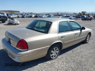 1999 Ford Crown Victoria z VIN 2FAFP73W7XX179492, wystawiony jako IAAI lot #42188954 z przebiegiem 137 299 mil mil oraz . Historia ofert i sprzedaży dostępna na DreamBid. Obrazek 4.