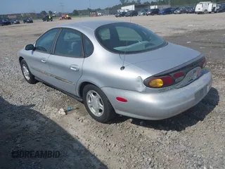 1997 Ford Taurus GL z VIN 1FALP52U9VA295404, wystawiony jako IAAI lot #42234839 z przebiegiem 163 080 mil mil oraz . Historia ofert i sprzedaży dostępna na DreamBid. Obrazek 3.