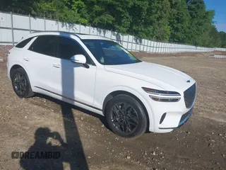 2023 Genesis GV70 2.5T z VIN KMUMADTB7PU120364, wystawiony jako IAAI lot #42186139 z przebiegiem 24 686 mil mil oraz . Historia ofert i sprzedaży dostępna na DreamBid. Obrazek 1.