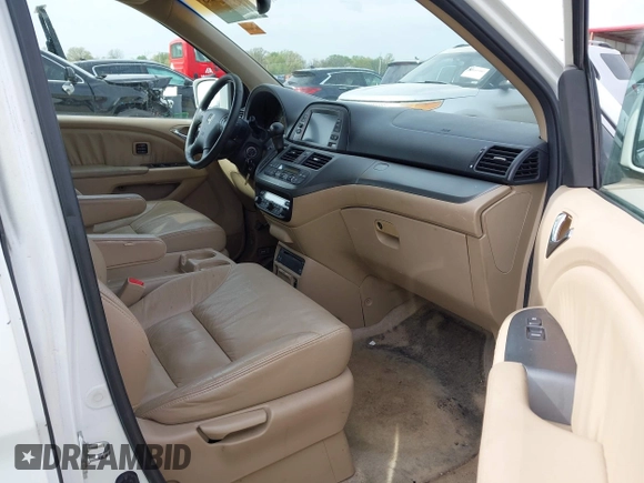 2007 Honda Odyssey Touring with VIN 5FNRL38887B081562, listed as a IAAI auction lot 42000435 with 238,287 mi miles and . Bid and sale history available at DreamBid. Image 5.