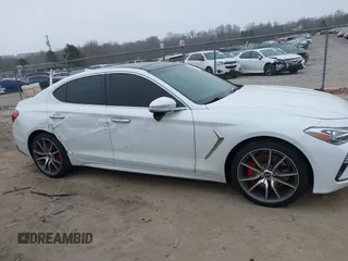 2020 Genesis G70 3.3T with VIN KMTG34LEXLU060919, listed as a IAAI auction lot 41619579 with 69,859 mi miles. Bid and sale history available at carsss.com. Image 14.