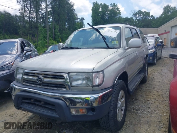 2000 Toyota 4Runner SR5 z VIN JT3HN86R1Y0296588, wystawiony jako IAAI lot #42193276 z przebiegiem 177 968 mil mil oraz . Historia ofert i sprzedaży dostępna na DreamBid. Obrazek 2.