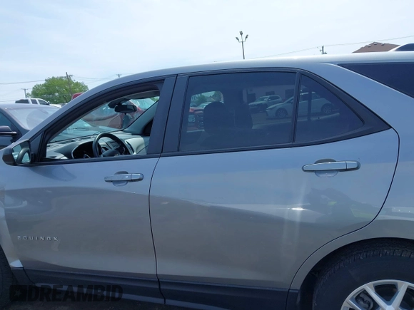 2023 Chevrolet Equinox LS z VIN 3GNAXSEG2PL166171, wystawiony jako IAAI lot #42378126 z przebiegiem 19 562 mil mil oraz . Historia ofert i sprzedaży dostępna na DreamBid. Obrazek 13.