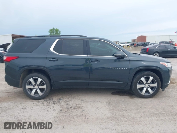 2021 Chevrolet Traverse LT with VIN 1GNERHKW4MJ191814, listed as a IAAI auction lot 42185544 with 87,493 mi miles and . Bid and sale history available at DreamBid. Image 13.