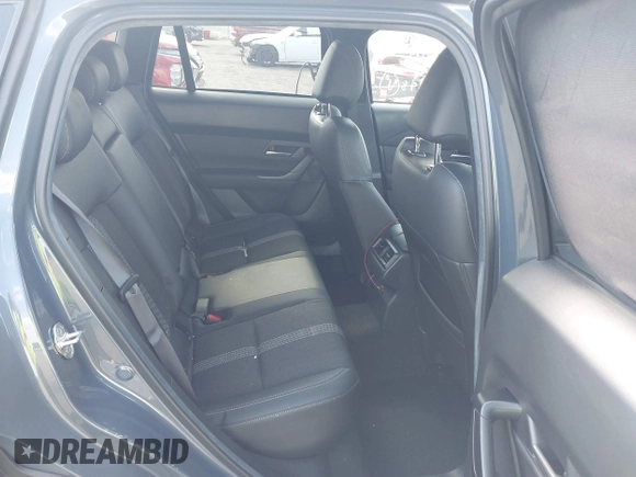 2024 Mazda CX-50 S Select with VIN 7MMVABAM5RN208388, listed as a IAAI auction lot 41301055 with 9,815 mi miles and . Bid and sale history available at DreamBid. Image 8.