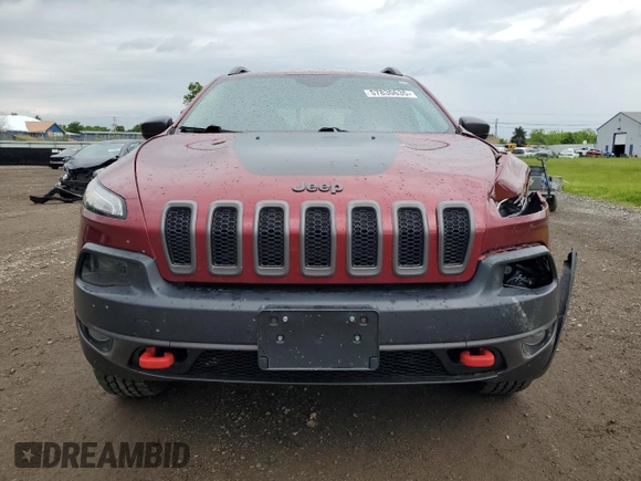 2014 Jeep Cherokee Trailhawk z VIN 1C4PJMBS2EW130125, wystawiony jako Copart lot #57830635 z przebiegiem 117 811 mil mil oraz Szkody całkowita. Historia ofert i sprzedaży dostępna na DreamBid. Obrazek 5.