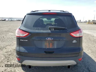2013 Ford Escape SE with VIN 1FMCU9GXXDUB64746, listed as a Copart auction lot 55111745 with 78,468 mi miles and Salvage Title. Bid and sale history available at DreamBid. Image 6.