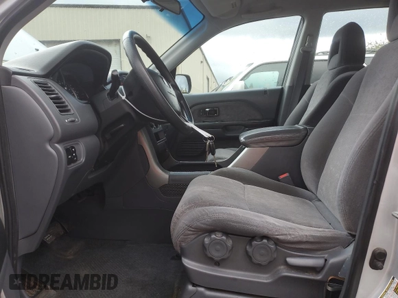 2005 Honda Pilot LX z VIN 2HKYF18195H511883, wystawiony jako Copart lot #53754595 z przebiegiem 269 419 mil mil oraz Szkoda całkowita • Salvage title. Historia ofert i sprzedaży dostępna na DreamBid. Obrazek 7.