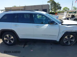 2022 Jeep Grand Cherokee with VIN 1C4RJYB66N8718018, listed as a IAAI auction lot 42002051 with Not provided miles and . Bid and sale history available at DreamBid. Image 12.