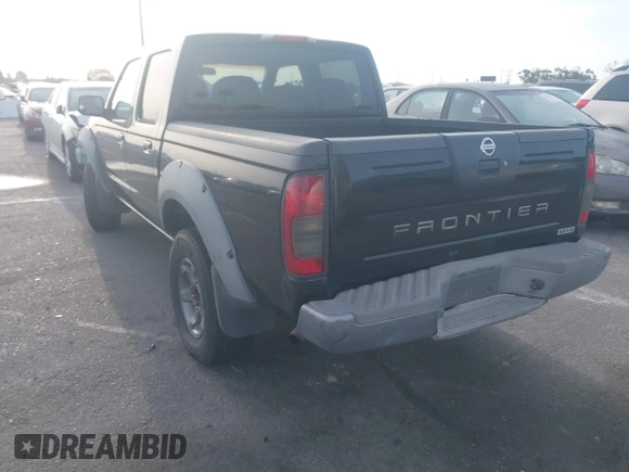2003 Nissan Frontier XE with VIN 1N6ED27T23C458693, listed as a IAAI auction lot 41932151 with 257,185 mi miles and . Bid and sale history available at DreamBid. Image 3.