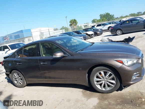 2015 Infiniti Q50 Premium z VIN JN1BV7AR3FM396882, wystawiony jako IAAI lot #37523335 z przebiegiem 89 761 mil mil oraz . Historia ofert i sprzedaży dostępna na DreamBid. Obrazek 12.