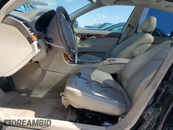 2003 Mercedes-Benz E-Class 3.2L with VIN WDBUF65J03X110125, listed as a Copart auction lot 70762014 with 389,223 mi miles and Clean Title. Bid and sale history available at carsss.com. Image 7.