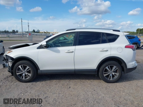 2018 Toyota RAV4 XLE with VIN JTMWFREV7JJ174483, listed as a IAAI auction lot 41597797 with 82,836 mi miles. Bid and sale history available at carsss.com. Image 15.