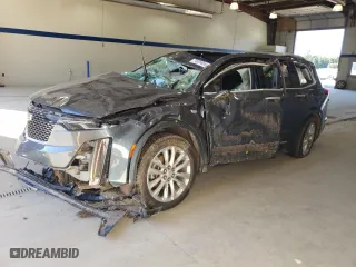 2020 Cadillac XT6 FWD Premium Luxury with VIN 1GYKPCRS0LZ207041, listed as a Copart auction lot 74805654 with 0 mi miles and Salvage Title. Bid and sale history available at carsss.com. Image 1.