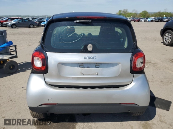 2016 Smart fortwo Passion with VIN WMEFJ5DA2GK069795, listed as a Copart auction lot 55079085 with 153,339 mi miles and Clean Title. Bid and sale history available at DreamBid. Image 6.