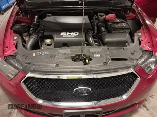 2014 Ford Taurus SHO with VIN 1FAHP2KT9EG130834, listed as a IAAI auction lot 41748199 with 98,857 mi miles and . Bid and sale history available at carsss.com. Image 10.