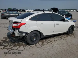 2013 Ford Focus SE with VIN 1FADP3F27DL258565, listed as a Copart auction lot 60662385 with 174,213 mi miles and Salvage title. Bid and sale history available at DreamBid. Image 3.
