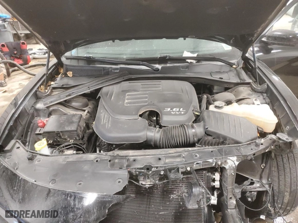 2022 Dodge Charger SXT with VIN 2C3CDXJGXNH203619, listed as a Copart auction lot 84207854 with 60,002 mi miles and Salvage Title. Bid and sale history available at carsss.com. Image 12.