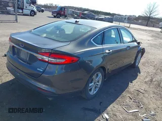 2018 Ford Fusion SE with VIN 3FA6P0HDXJR165459, listed as a IAAI auction lot 41810123 with 97,281 mi miles. Bid and sale history available at carsss.com. Image 4.