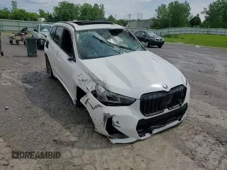 2023 BMW X1 xDrive28i with VIN WBX73EF08P5X60980, listed as a Copart auction lot 59899385 with 21,975 mi miles and Salvage title. Bid and sale history available at DreamBid. Image 15.