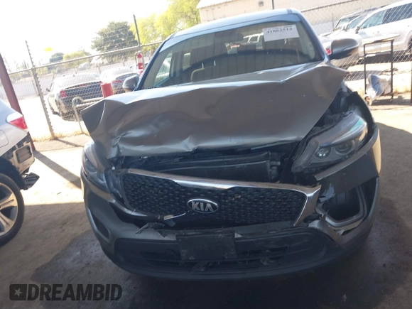 2018 Kia Sorento L z VIN 5XYPG4A39JG339992, wystawiony jako IAAI lot #41862512 z przebiegiem 119 430 mil mil oraz . Historia ofert i sprzedaży dostępna na DreamBid. Obrazek 13.