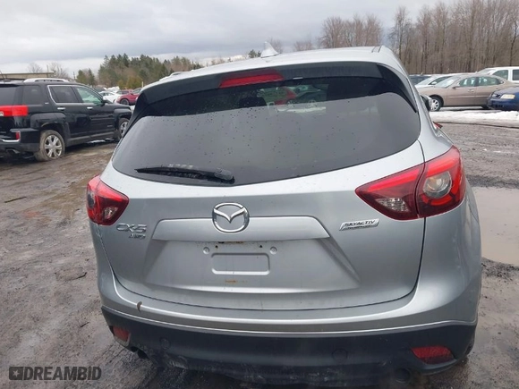2016 Mazda CX-5 Grand Touring with VIN JM3KE4DY0G0816466, listed as a IAAI auction lot 41720059 with NaN miles. Bid and sale history available at carsss.com. Image 16.