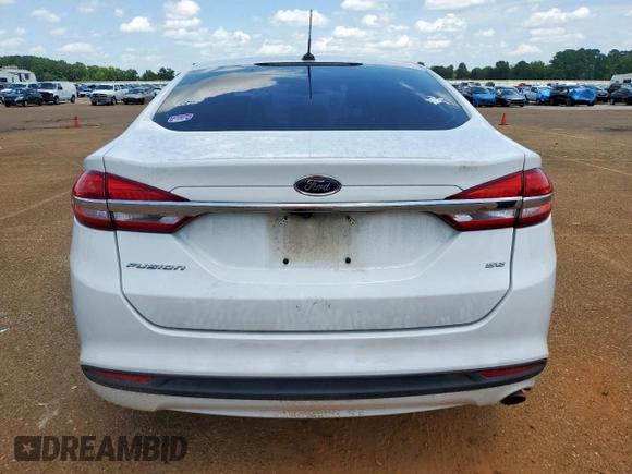 2017 Ford Fusion SE z VIN 3FA6P0H77HR235214, wystawiony jako Copart lot #63560815 z przebiegiem 273 965 mil mil oraz Szkoda całkowita • Salvage title. Historia ofert i sprzedaży dostępna na DreamBid. Obrazek 6.